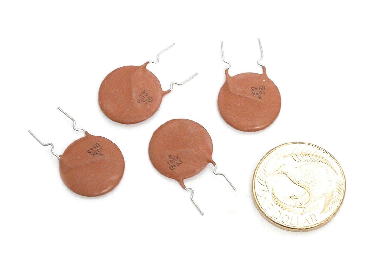 10nF-K-500V-RAD-DD18-64B-Murata_01.JPG  (124.4 Kb)